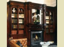 Victorian style sustainable mahogany (sapele) library bookcases with hand carved mantel and over-mantel